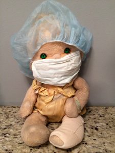 The twins' doll, Patooty, even "awoke" with a bandage after surgery