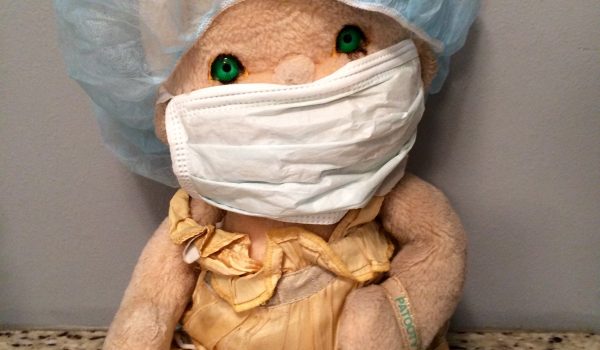 Doll with bandage