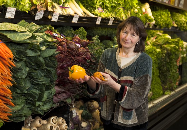 Dr. Julie Mares with fresh produce