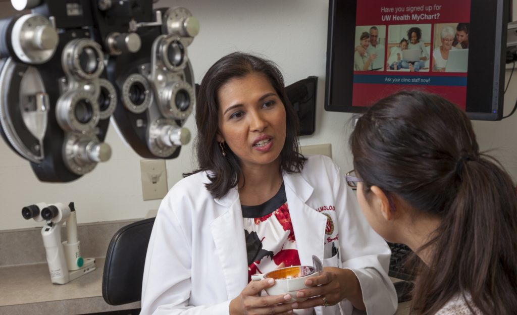Dr. Yasmin Bradfield Speaking to a Patient