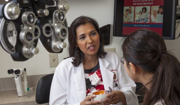 Dr. Yasmin Bradfield Speaking to a Patient