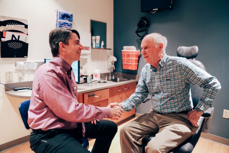 Doctor Heatley and Patient Shake Hands at UW DOVS Clinic