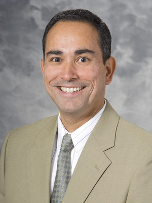 John E. Temprano, MD