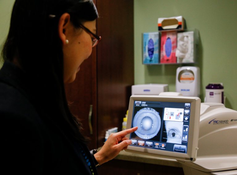 Yao Liu, MD, examines a rural WI patient
