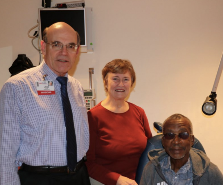 Dr. Nork evaluating a patient from Nigeria.