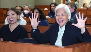 Dr. Cat Burkat and Dr. Navarro laugh together.