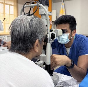 doctor examining a patient's eyes