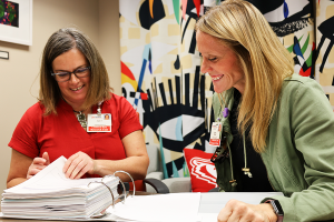 CERU's Angie Adler and Nickie Stangel review clinical trial procedures