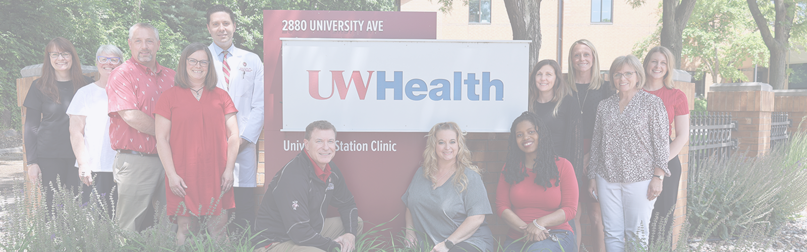 Team CERU stand by the UW Health sign