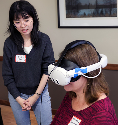 A workshop participant tries AI-Assisted technology