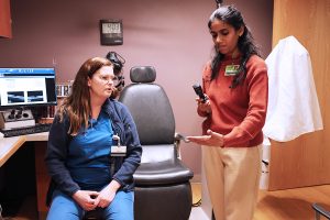 Dr. Melanie Schmitt instructs resident mentee Dr. Srishti Sahay during her rotation at UW from Dr. Shroff's Charity Eye Hospital, in India. 