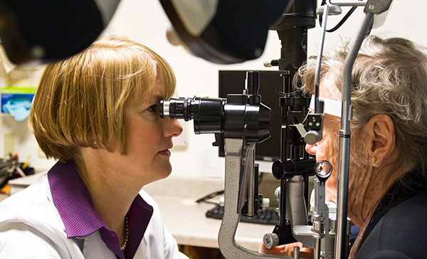 Dr. Blodi with a patient, 2011