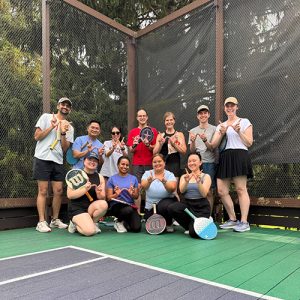 group on a pickleball court