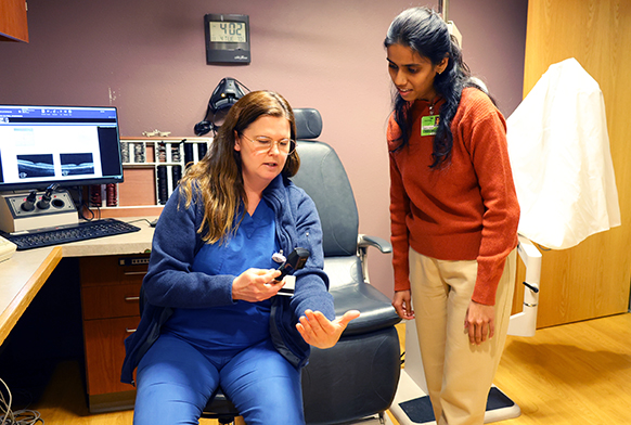 Dr. Melanie Schmitt teaching a visiting resident
