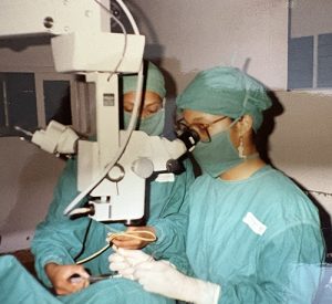 Dr. Terri Young performing eye surgery as a resident in India